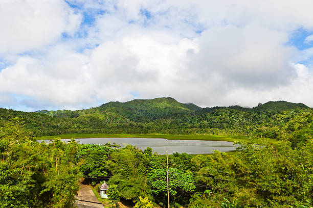 Grand Etang Lake, Grenada Grand Etang Lake is an extinct volcano of approximately 20 feet deep, located at the center of Grenada at 1,800 feet (550 m) above sea level. It is in the middle of the Grand Etang National Park, a very popular area in Grenada, for hiking and trekking but not only. The rain forest around the lake includes several waterfalls, hot springs, plantations and a series of trails among breathtaking sceneries. Grenada W.I. Canon EOS 5D Mark II extinct volcano stock pictures, royalty-free photos & images