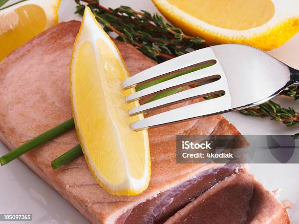 Tuna Steak And Lemon Stock Photo - Download Image Now - Cod Liver Oil, Food and Drink, Fork
