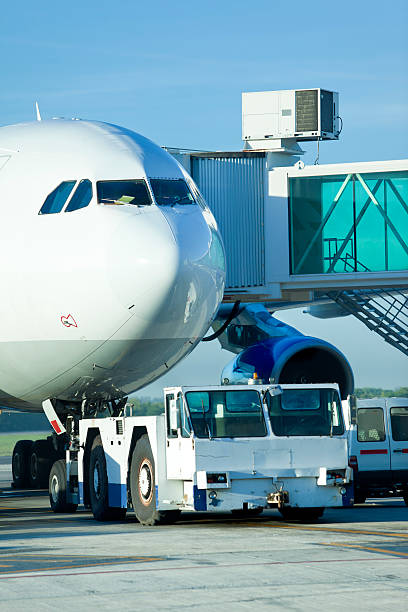 istock Airplane with gangway waiting for the passengers 185097524