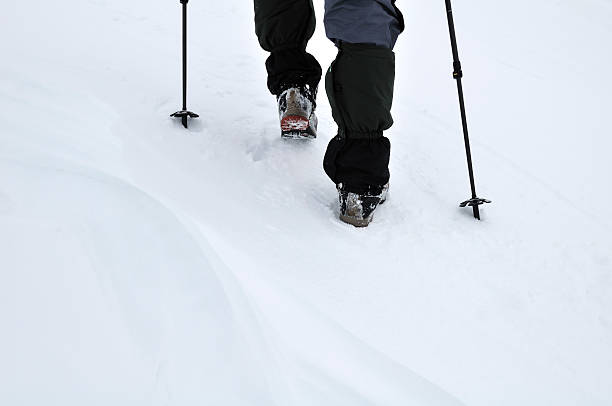 istock Mountain man climbing in winter season 185098183