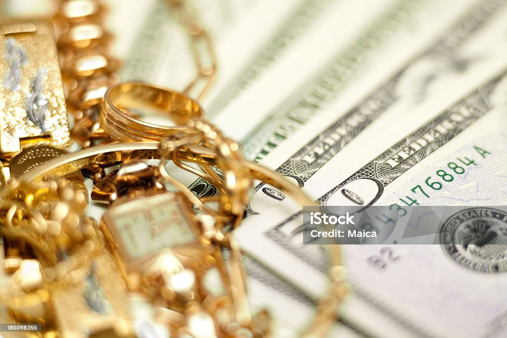 Buying gold concept Trading gold and jewels for dollars. Selective focus on money. Gold - Metal Stock Photo