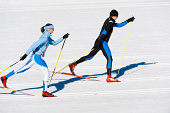 Young couple at cross country skiing