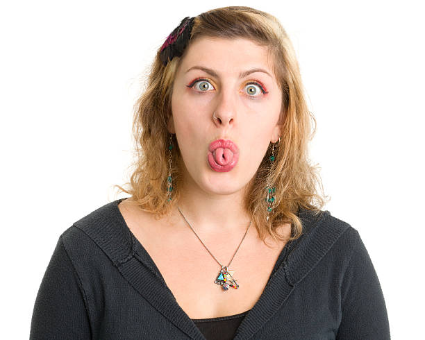 istock Young Woman Sticking Out Tongue 185099157