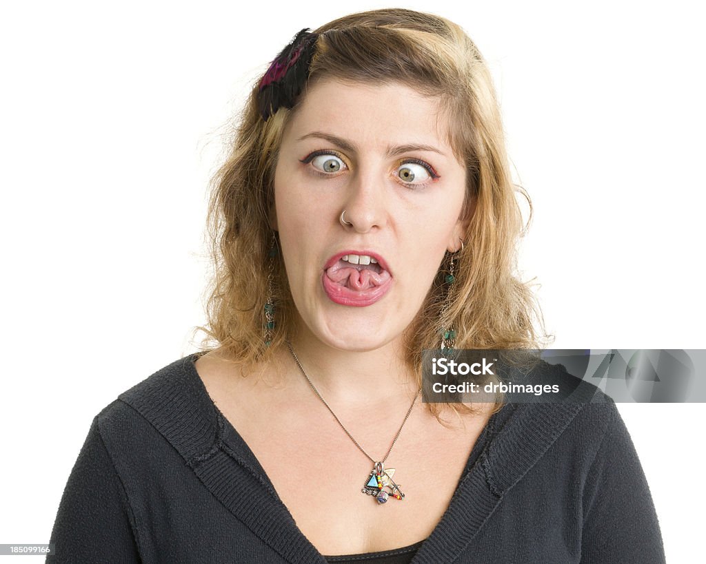 Jeune femme Se courber la languette - Photo de 20-24 ans libre de droits