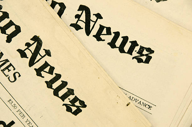 Close-up view of two old yellowed newspaper Headline The mastheads (names) for 40 year old newspapers. The words News in black. Close-up figurehead stock pictures, royalty-free photos & images