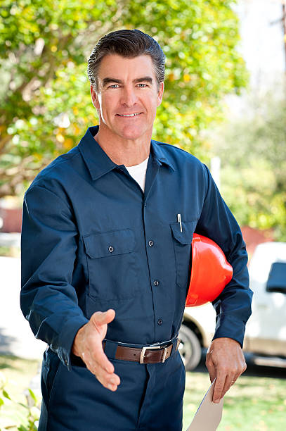 istock Repairman In Uniform & Hard Hat 185099619