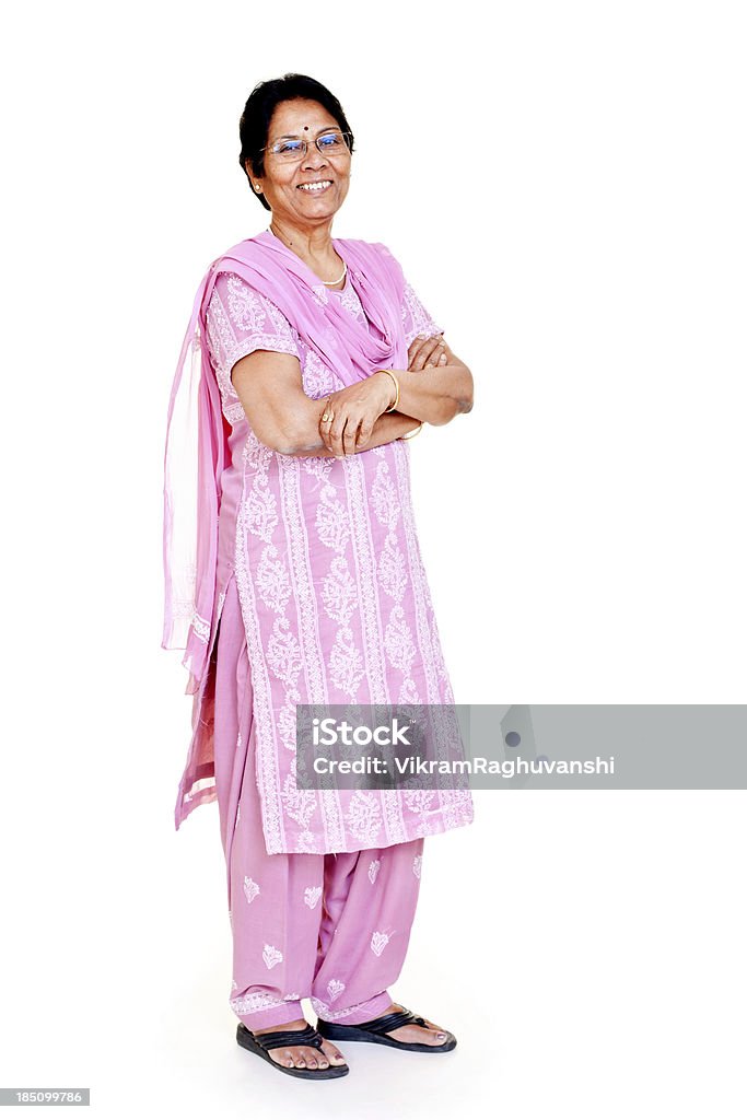 Local Casual Indian Senior Women Full Length Isolated on white Cheerful Casual Indian Senior Women Full Length Isolated on white Indian Ethnicity Stock Photo