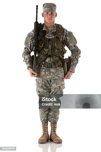 Portrait Of An Army Man With A Rifle Stock Photo - Download Image Now - Army Soldier, Armed Forces, White Background