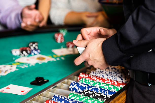 Blackjack Dealer Hands In a Casino stock photo