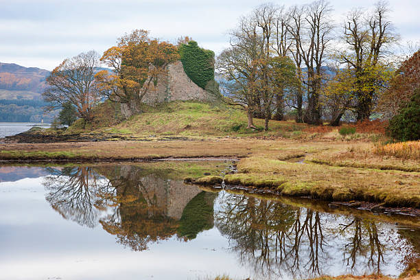 Old Castle Lachlan, Argyll "Looking across Lachlan Bay to Old Castle Lachlan. Built sometime around the 1400s, this was the seat of Clan MacLachlan. The MacLachlans supported the Jacobite uprising and in 1746, after the defeat of the Jacobites at Culloden, the castle was bombarded from the sea by the English and the castle was abandoned." loch fyne stock pictures, royalty-free photos & images