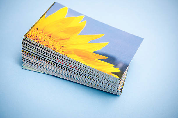 stack of printed colorful images about spring sunflower - print fotos stockfoto's en -beelden