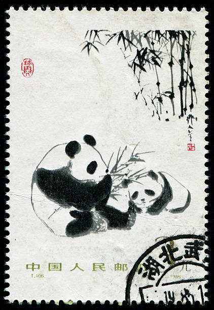 Panda Stamp Cancelled Stamp From China Featuring A Traditional Style Painting Of Pandas chinese postage stamp stock pictures, royalty-free photos & images