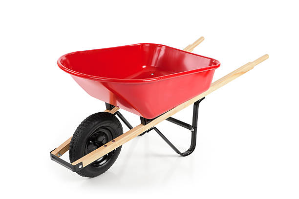 istock Red wheelbarrow against a white background 185101864