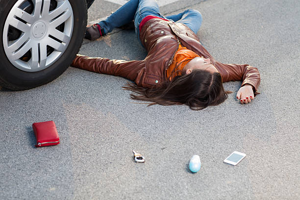 istock Traffic accident..young woman hit by a car 185102842