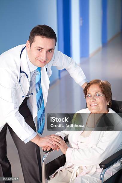 Young Doctor And Senior Patient Stock Photo - Download Image Now - 30-34 Years, 60-69 Years, Adult