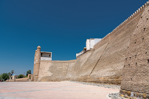 View to the entrance Gates of the Ark, the Medieval massive Bukhara Fortress in Uzbekistan