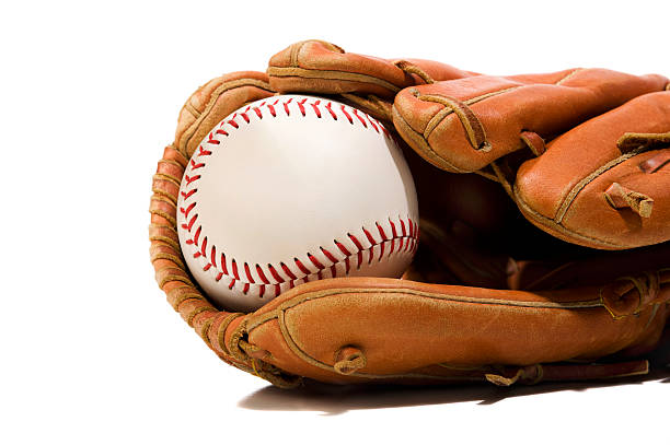 istock New Softball in a glove 185104240