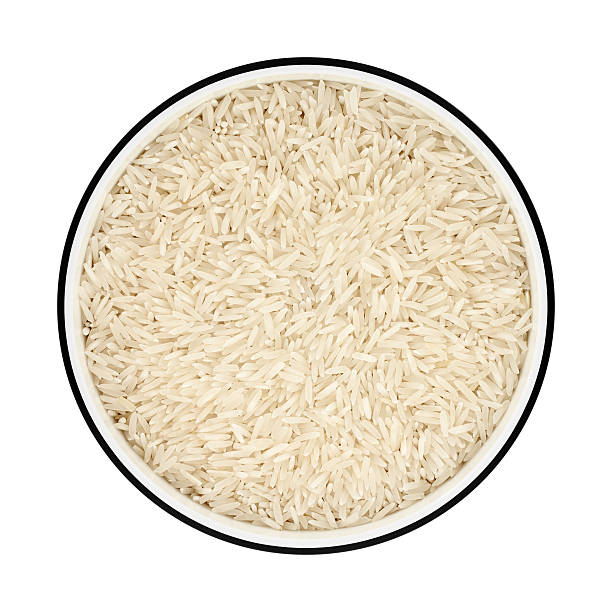 riso basmati in una ciotola da direttamente sopra - clipping path rice white rice basmati rice foto e immagini stock