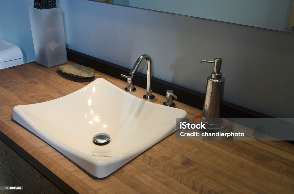 Close up of modern bathroom sink This close up is a the bathroom sink. Bathroom Sink Stock Photo