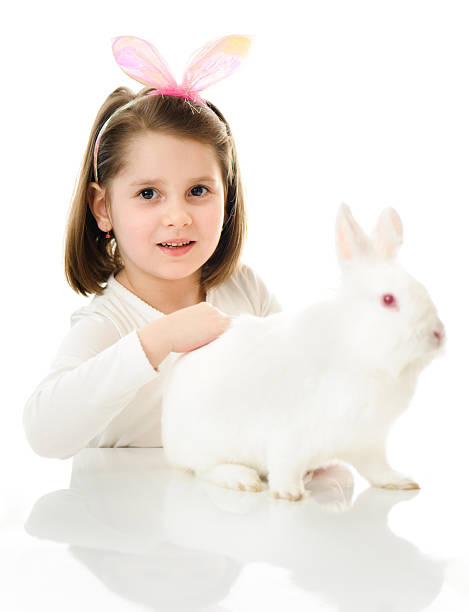 istock Little girl with Easter bunny 185105230