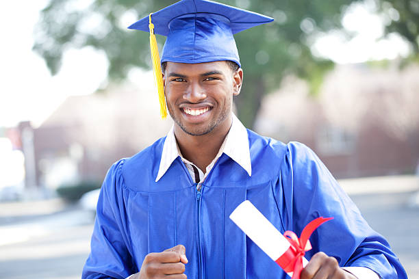 istock young african american with diploma 185106013