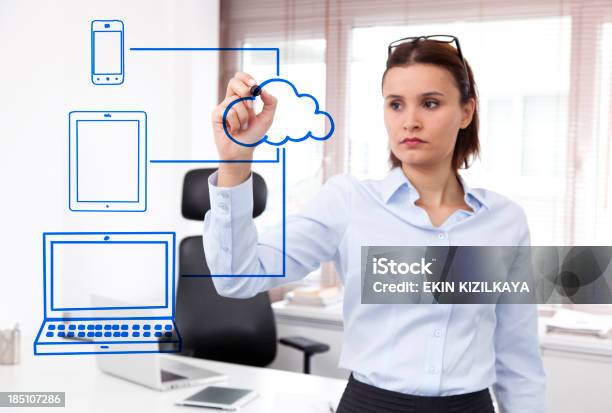 Businesswoman Drawing A Cloud Computing Schema Stock Photo - Download Image Now - Adult, Advice, Business