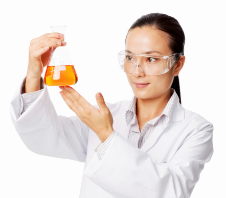 Asian female researcher analyzing a sample in the conical flask. Horizontal shot. Isolated on white.