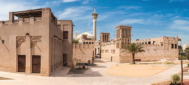 istock Mosque minaret and traditional wind towers Dubai 185108818