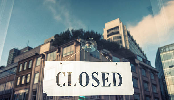 Closed sign on a window shopping in London