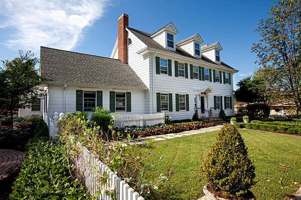 istock Luxury home in white with green grass 185109184