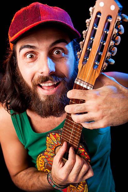 istock Musician playing small guitar at concert 185109676