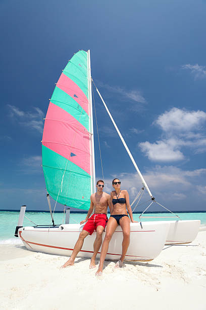 istock couple catamaran island 185109947