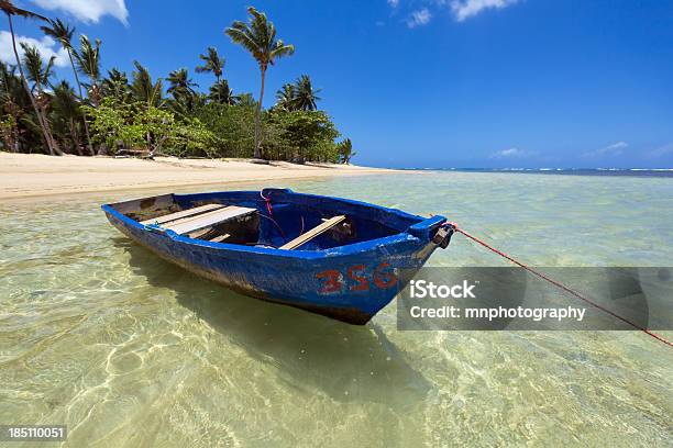 Foto de A Close Up Wide Angle Photo Of A Fiberglass Fishing Boat In The Sparkling Waters Of The Carribbean Sea Photo Taken In The Dominican Republic e mais fotos de stock de Veículo Aquático