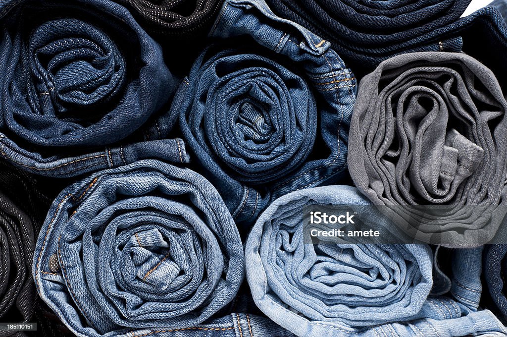 Rolled Denim Jeans Stack of rolled jeans Jeans Stock Photo
