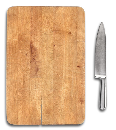 Wooden bread cutting board with stainless steel knife isolated on white background. Two clipping paths included. Ready for preparing food.