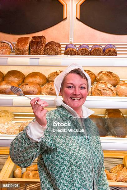 Female Bakery Shop Assistant Stock Photo - Download Image Now - Adult, Adults Only, Artisanal Food and Drink