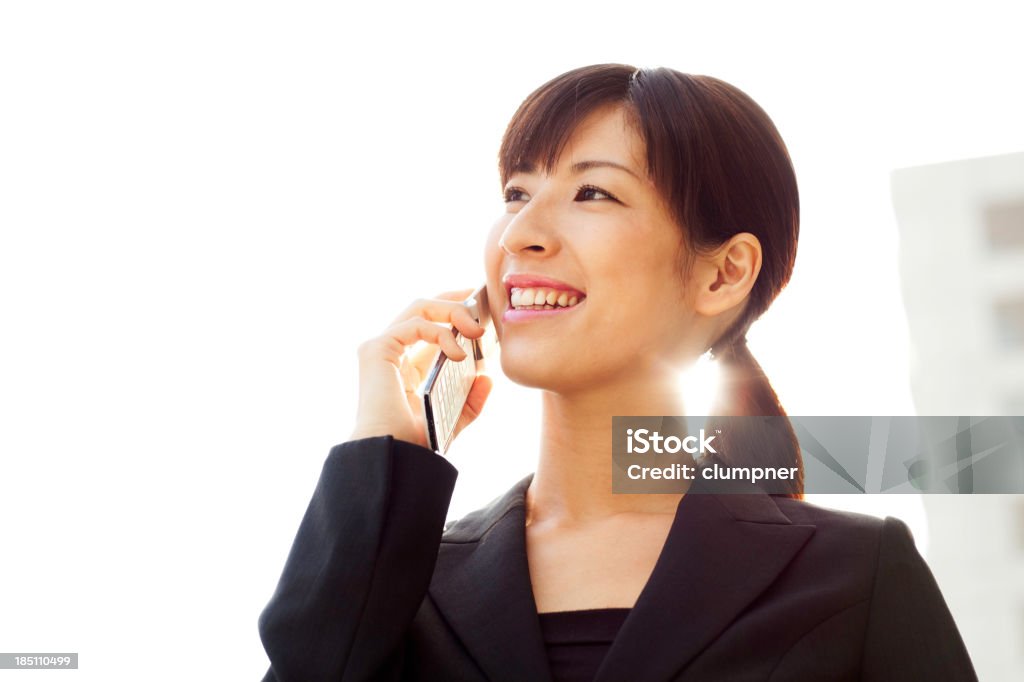 Mulher de negócios asiáticos com telefone - Foto de stock de 20 Anos royalty-free