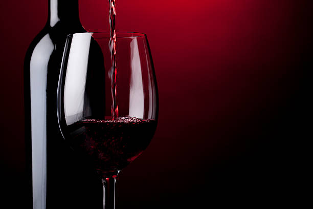 Pouring red wine Pouring red wine red wine stock pictures, royalty-free photos & images