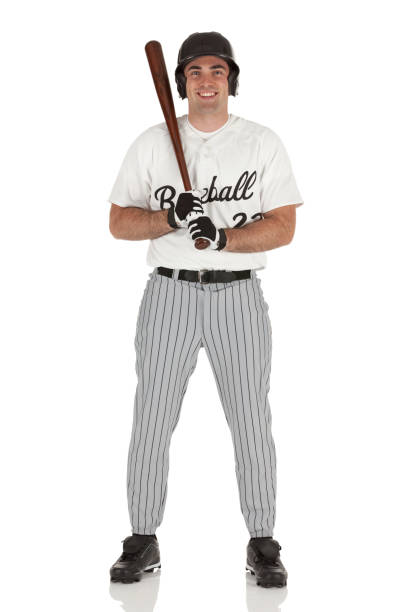 бейсболист - baseball player baseball holding bat стоковые фото и изображения