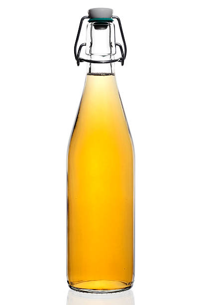 Bottle of Apple Juice. "Bottle of apple juice, isolated on white." alte algarve stock pictures, royalty-free photos & images