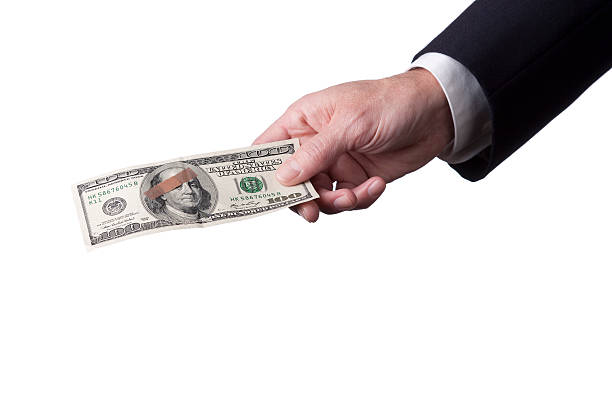 istock Businesman's Hand Holding a Bandaged 100 Dollar Bill 185111062
