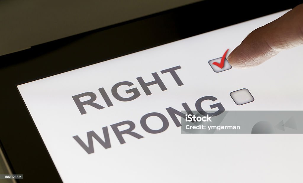 Right and wrong checkboxes on a tablet "Right and wrong checkboxes on a tablet, clicking rightClick" Advice Stock Photo