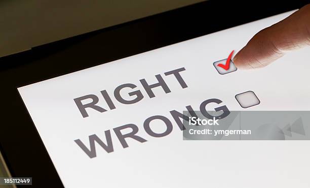 Right And Wrong Checkboxes On A Tablet Stock Photo - Download Image Now - Advice, Analyzing, Business