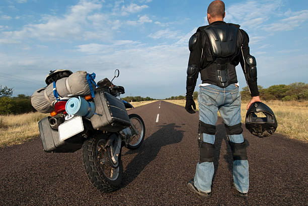 motorcycle journey on tarmac stock photo