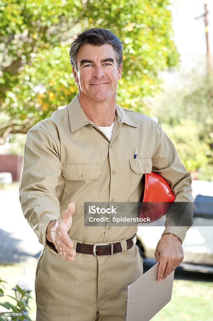 Handwerker In Uniform & Schutzhelm - Lizenzfrei Arbeiter Stock-Foto