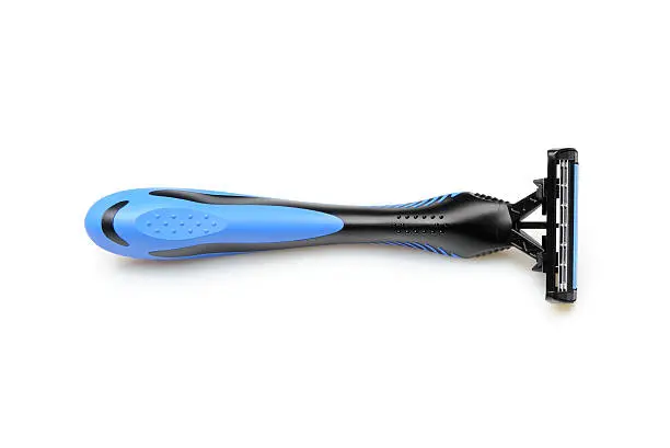 black and blue shaving razor with tree blades isolated on white. More pictures...