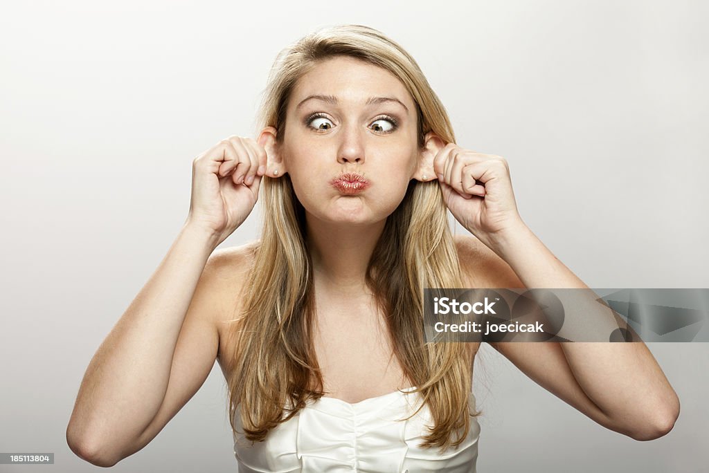 Silly faccia - Foto stock royalty-free di Guance gonfie