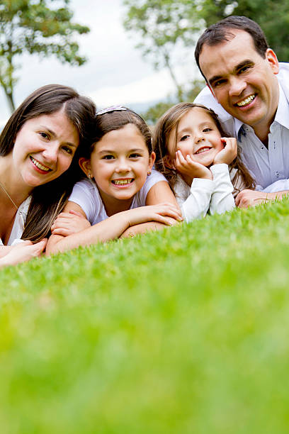 istock Family lying outdoors 185114147