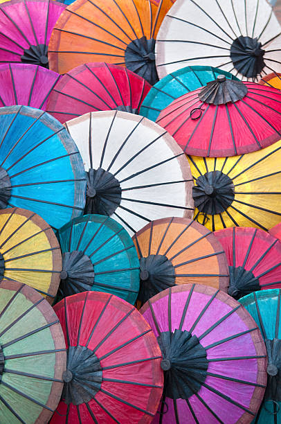 カサカラフルな背景 - parasol umbrella asian ethnicity asian culture ストックフォトと画像