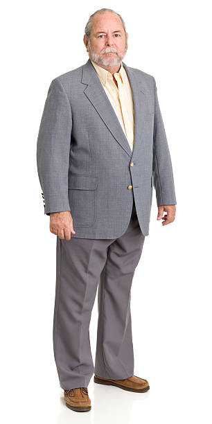 grave uomo anziano in abito grigio - overweight men businessman isolated foto e immagini stock